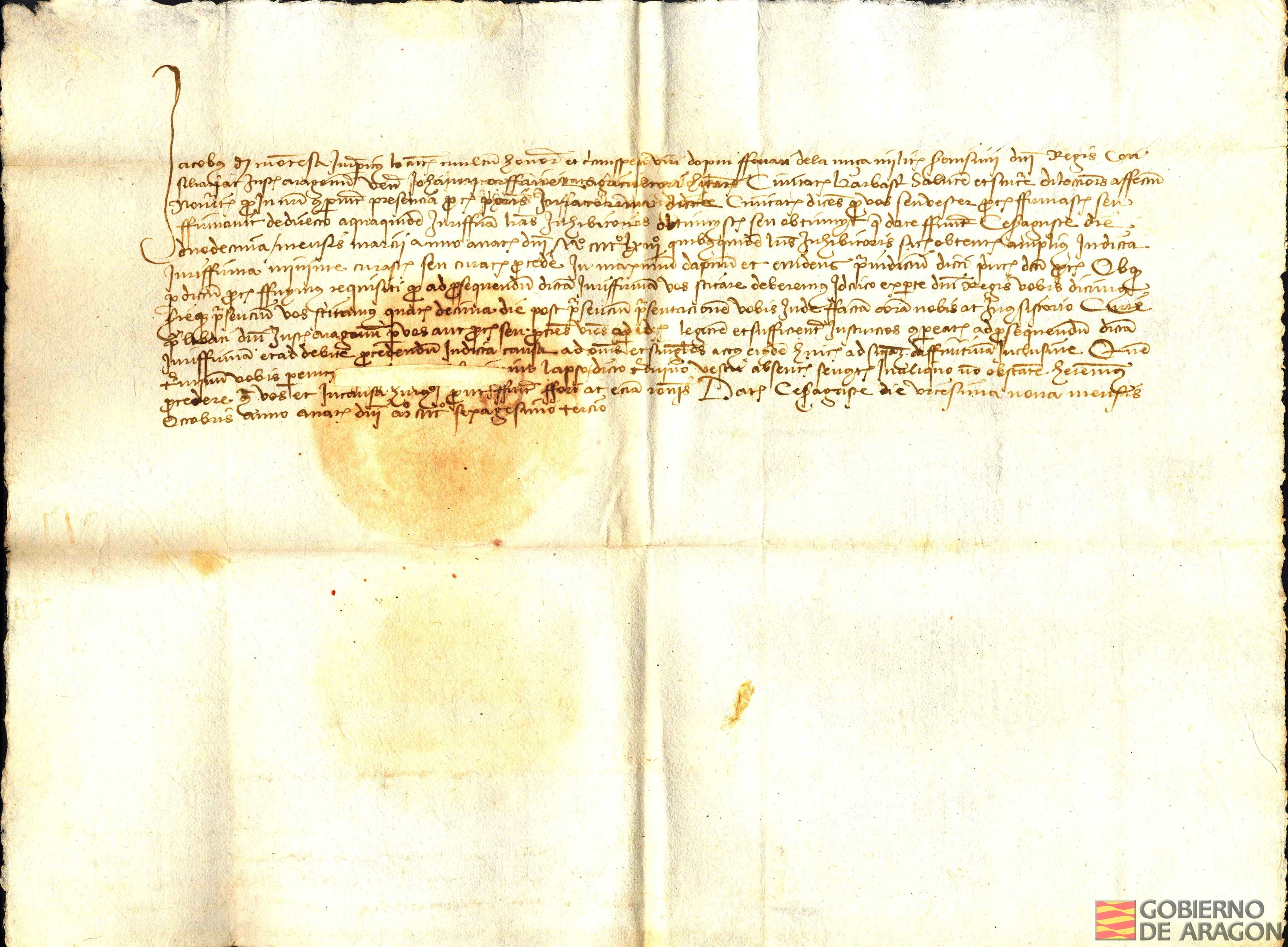 Jaime de Montesa, jurista y lugarteniente de Ferrer de Lanuza, Justicia de Aragón, escribe a Juan Orfanel, agricultor de Barbastro, para citarle a una comparecencia en la corte de dicho Justicia diez días después de la recepción de la presente, acerca de una jurisfirma que había hecho para inhibirse de una acción del prior de los jurados del concejo de Barbastro