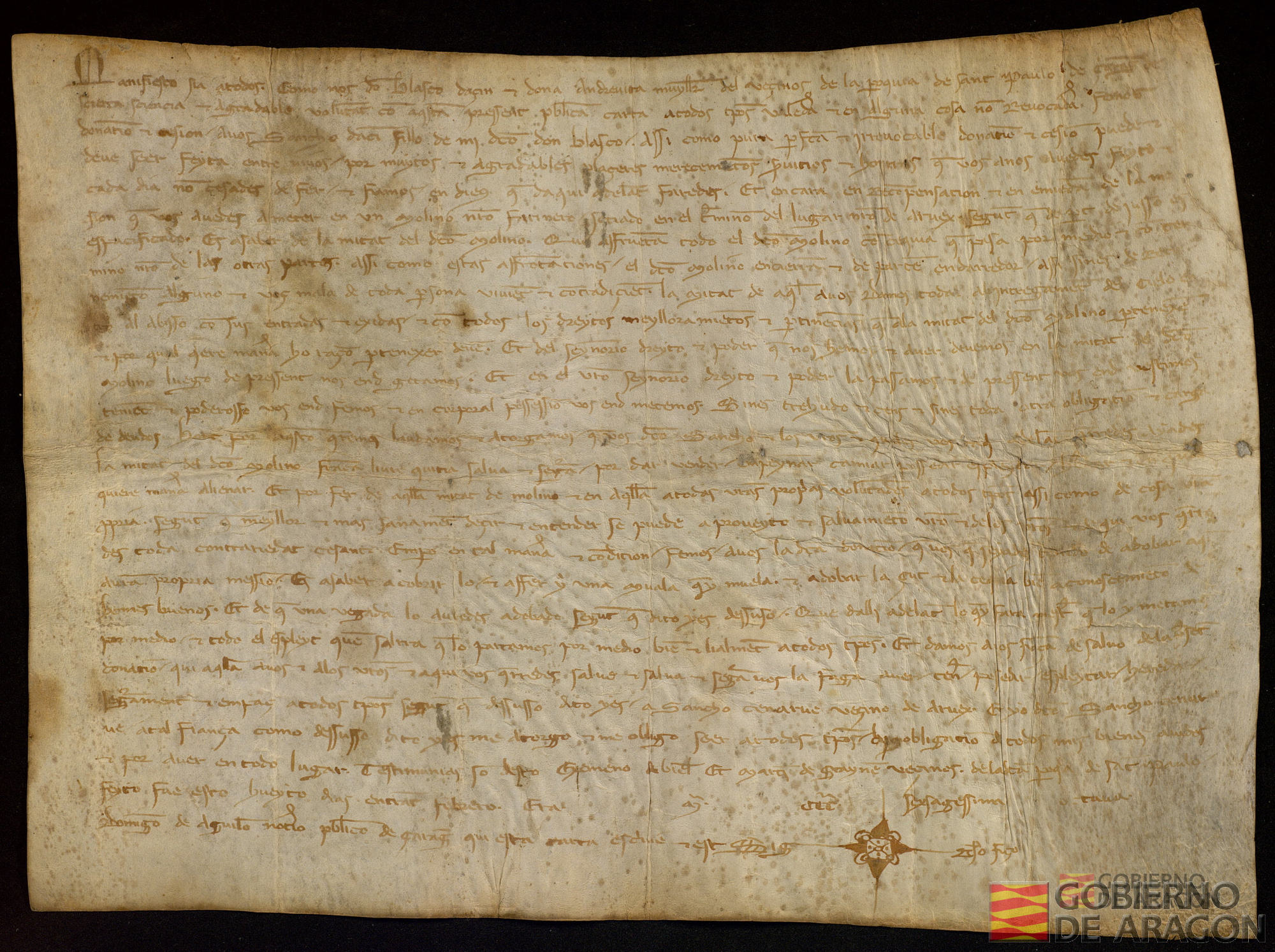 Blasco de Acín y su mujer dona Andrea Vita, vecinos de la parroquia de San Pablo de Zaragoza, entregan a Sancho de Acín, hijo de don Blasco, la mitad de un molino harinero en Aruej con ciertas condiciones y a cambio de la entrega de la mitad de la moltura