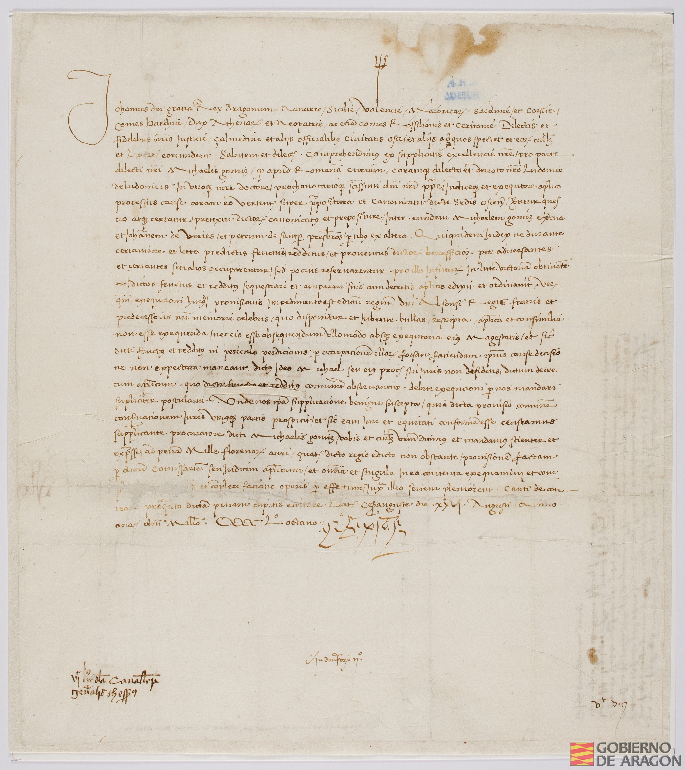 Juan II, rey de Aragón, manda que se ejecute el decreto del rey Alfonso V, su hermano, en relación con el proceso ante la curia romana entre Miguel Gómez, de una parte, y Juan de Urriés y Pedro Samper, de otra, sobre la prepositura y canonicato de la sede oscense