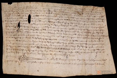 Pedro Borja, habitante en Larués y espondalario del último testamento de Fernando de Solana y su mujer Jordana, vende a Juan de Solana y su mujer Sancha unas casas sitas en Larués