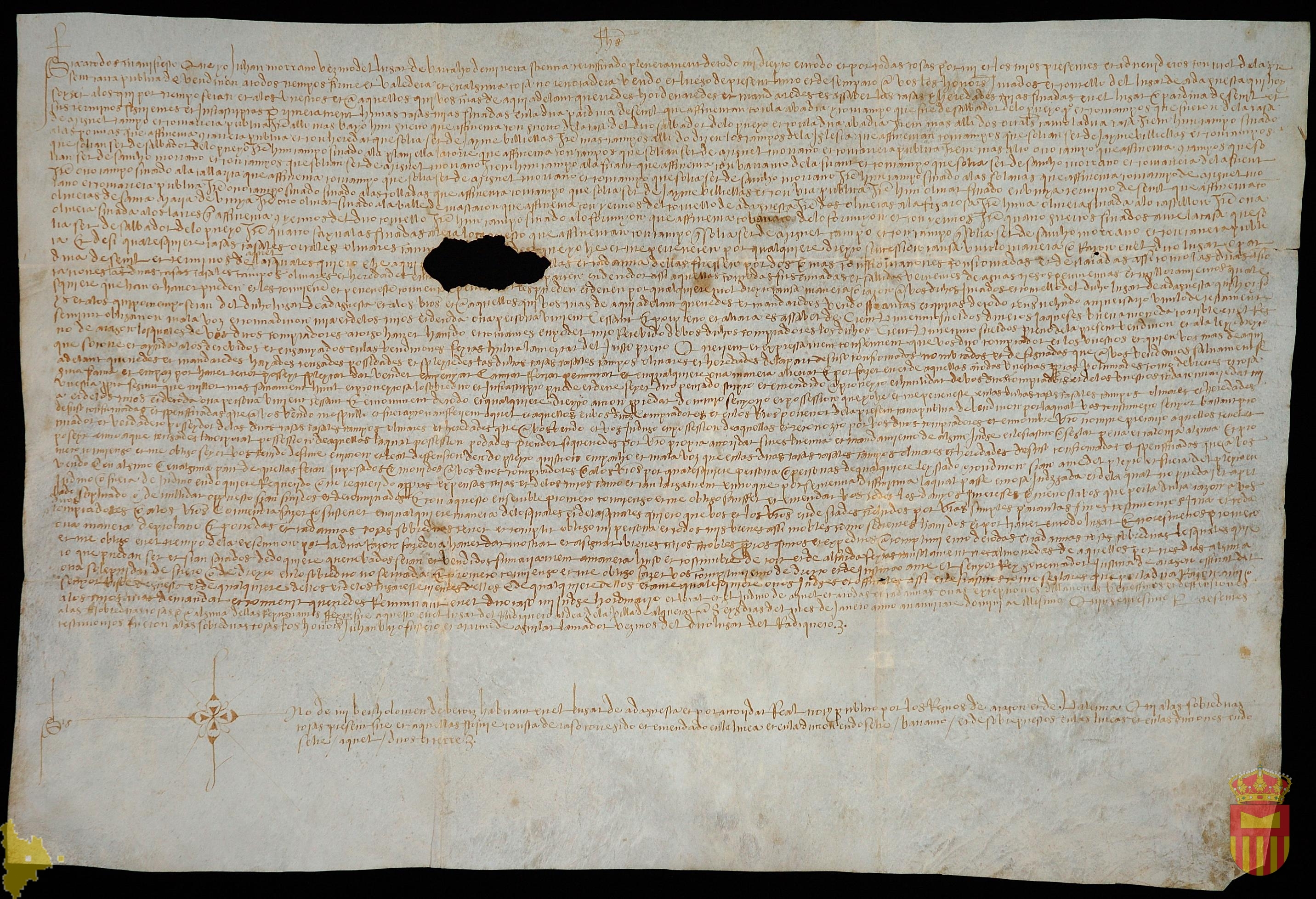 Carta de venta por la que Juan Morrano, vecino de Bárcabo, vende al concello y jurados de Adahuesca unas casas y heredades en la pardina de Sevil por ciento veintinueve suledos jaqueses