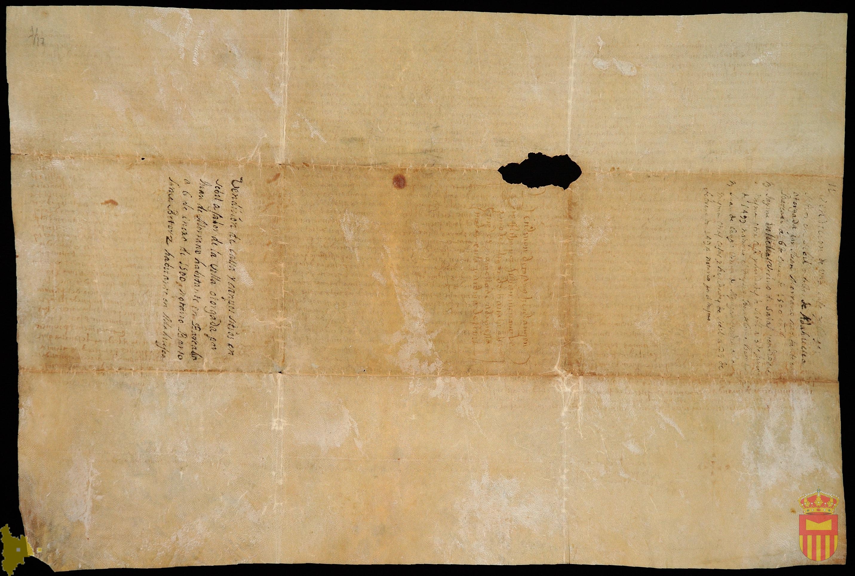 Carta de venta por la que Juan Morrano, vecino de Bárcabo, vende al concello y jurados de Adahuesca unas casas y heredades en la pardina de Sevil por ciento veintinueve suledos jaqueses.